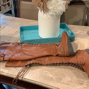Brown Torrid over-the-knee combat boots